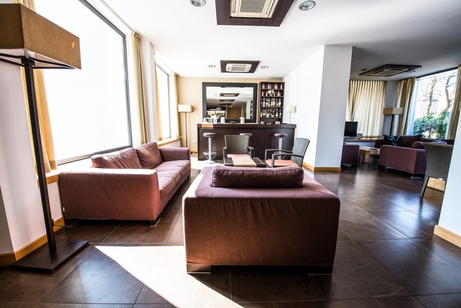 Try the delicious drinks at the bar of Hotel Touring Carpi